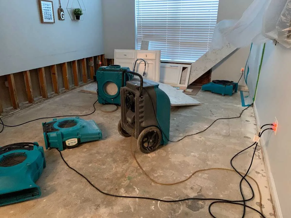 Dehumidifier in flood-cut room for Water Damage Restoration in Walker